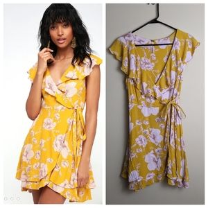 Free People yellow floral french quarter wrap dress
